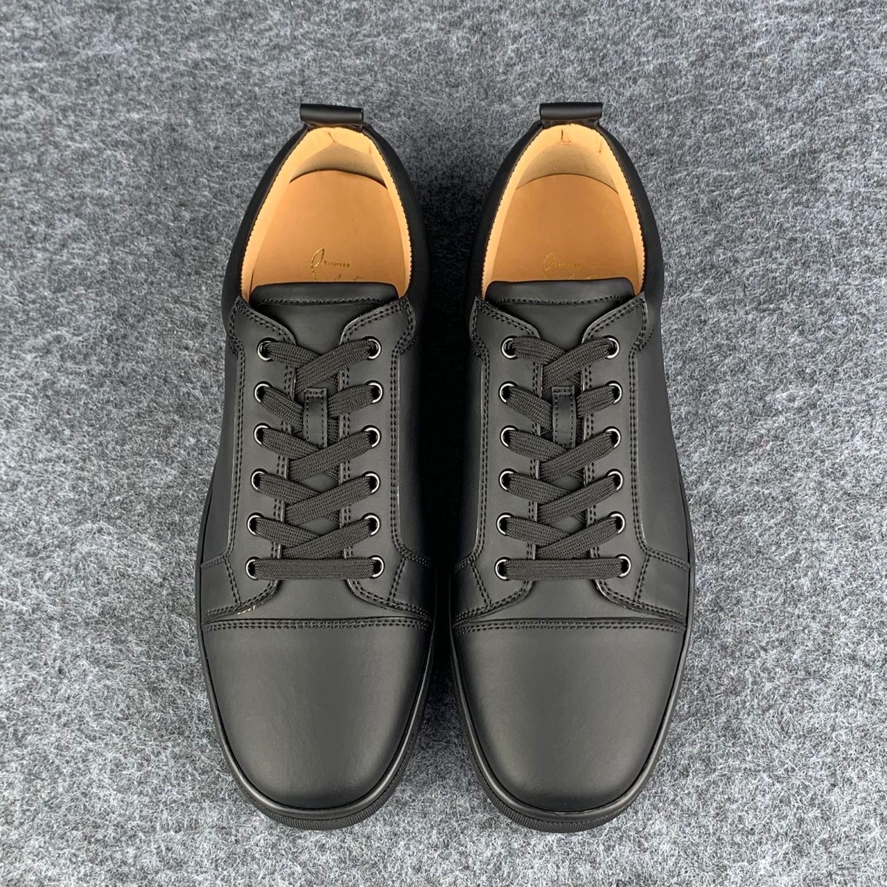 Christian Louboutin Louis Junior Low-Top Sneaker “Black Calfskin”